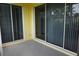 Sliding glass doors open onto a cozy, screened-in lanai at 2000 Bal Harbor Blvd # 1012, Punta Gorda, FL 33950