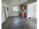 Garage with cabinets and extra space at 240 Cicero Nw St, Port Charlotte, FL 33948