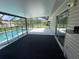 Screened patio overlooking a refreshing pool and backyard at 240 Cicero Nw St, Port Charlotte, FL 33948