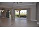 Dining room with access to a screened patio overlooking a golf course at 3959 San Rocco Ct # 911, Punta Gorda, FL 33950