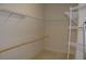 Spacious walk-in closet with ample shelving and hanging rods at 3959 San Rocco Ct # 911, Punta Gorda, FL 33950