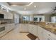 Gourmet kitchen with granite countertops and white cabinets at 3959 San Rocco Ct # 911, Punta Gorda, FL 33950