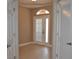 Bright entryway with tile flooring and built-in storage at 3959 San Rocco Ct # 911, Punta Gorda, FL 33950