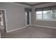 Primary bedroom with access to the patio at 3959 San Rocco Ct # 911, Punta Gorda, FL 33950