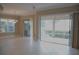 Bright dining area with sliding doors leading to a patio at 3959 San Rocco Ct # 911, Punta Gorda, FL 33950