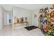 Bright and spacious entryway, decorated for the fall season at 335 Kenova St, Port Charlotte, FL 33954
