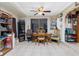 Cozy dining area with wooden table and chairs, plus built-in shelving at 335 Kenova St, Port Charlotte, FL 33954