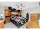 Large bedroom with sunflower bedding and built-in headboard at 335 Kenova St, Port Charlotte, FL 33954