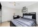 Well-lit bedroom featuring a double bed and dresser at 335 Kenova St, Port Charlotte, FL 33954