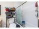 Clean bathroom with shower/tub combo and storage at 335 Kenova St, Port Charlotte, FL 33954