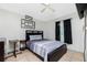 Bright bedroom with a double bed and ceiling fan at 335 Kenova St, Port Charlotte, FL 33954