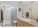 Bathroom with shower, vanity, and toilet at 335 Kenova St, Port Charlotte, FL 33954