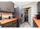 Kitchen with stainless steel refrigerator and pantry at 335 Kenova St, Port Charlotte, FL 33954
