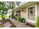 Single-story house exterior with landscaped yard and decorative accents at 335 Kenova St, Port Charlotte, FL 33954