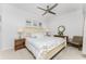 Bright bedroom with a king-size bed and ensuite bathroom at 14071 Heritage Landing Blvd # 327, Punta Gorda, FL 33955