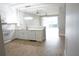 Modern kitchen featuring white cabinets, quartz countertops, and stainless steel appliances at 2000 Bal Harbor Blvd # 1012, Punta Gorda, FL 33950