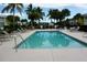 Inviting community pool with surrounding lounge chairs at 2000 Bal Harbor Blvd # 1012, Punta Gorda, FL 33950