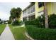 Building exterior showcasing the well-maintained landscaping at 2000 Bal Harbor Blvd # 1012, Punta Gorda, FL 33950