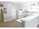 Modern kitchen with white cabinets and quartz countertops at 2000 Bal Harbor Blvd # 1012, Punta Gorda, FL 33950