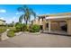 Condo exterior showcasing parking and walkway at 26283 Nadir Rd # 201, Punta Gorda, FL 33983
