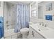 Clean bathroom with shower/tub combo and white vanity at 26283 Nadir Rd # 201, Punta Gorda, FL 33983