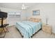 Spacious bedroom with a king-size bed and water view at 26283 Nadir Rd # 201, Punta Gorda, FL 33983