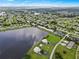Wide aerial view of community by the lake at 26283 Nadir Rd # 201, Punta Gorda, FL 33983