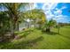 Landscaped backyard with lush tropical foliage at 13216 Donaldson Ave, Port Charlotte, FL 33953
