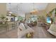 Open-concept living space with kitchen and pool view at 13216 Donaldson Ave, Port Charlotte, FL 33953
