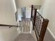 View down the stairs showing a large open area below at 240 Cicero Nw St, Port Charlotte, FL 33948