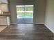 Dining area with sliding glass doors opening to the pool at 240 Cicero Nw St, Port Charlotte, FL 33948