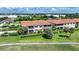 Condo building with pool, showcasing a prime location near a golf course at 3959 San Rocco Ct # 911, Punta Gorda, FL 33950