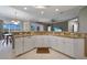 Modern kitchen featuring granite countertops and a large island at 3959 San Rocco Ct # 911, Punta Gorda, FL 33950
