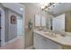 Bathroom with a single vanity and built in shelves at 3959 San Rocco Ct # 911, Punta Gorda, FL 33950