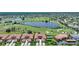 Aerial view of community near golf course and lake at 3959 San Rocco Ct # 911, Punta Gorda, FL 33950