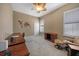 Bright home office features built-in shelving and comfortable seating at 3959 San Rocco Ct # 911, Punta Gorda, FL 33950