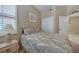 Charming bedroom with wood furniture and window shutters at 3959 San Rocco Ct # 911, Punta Gorda, FL 33950