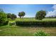 Landscaped backyard with golf course views at 3959 San Rocco Ct # 911, Punta Gorda, FL 33950