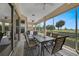 Enjoy outdoor dining and golf course views from this screened lanai at 3959 San Rocco Ct # 911, Punta Gorda, FL 33950