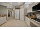 Bright kitchen featuring granite countertops, white cabinets, and a gas cooktop at 3959 San Rocco Ct # 911, Punta Gorda, FL 33950