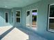 Covered patio with multiple access points at 10133 Audrey St, Port Charlotte, FL 33981