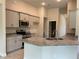 Modern kitchen with granite countertops and stainless steel appliances at 10133 Audrey St, Port Charlotte, FL 33981