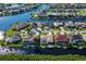 Luxury waterfront community with numerous homes and lush landscaping at 729 Macedonia Dr, Punta Gorda, FL 33950