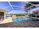 Relaxing pool area with screened enclosure and canal view at 729 Macedonia Dr, Punta Gorda, FL 33950