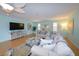 Living room features comfortable seating, a large TV, and light walls at 729 Macedonia Dr, Punta Gorda, FL 33950