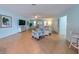 Relaxing living room with seating area, decorative accents, and tiled floors at 729 Macedonia Dr, Punta Gorda, FL 33950