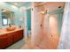 Bathroom with walk-in shower, vessel sink, and modern vanity at 729 Macedonia Dr, Punta Gorda, FL 33950