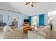 Living room with large window and view of backyard at 1355 Hempstead Ave, North Port, FL 34286