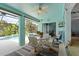 Relaxing screened-in pool area with patio furniture at 1355 Hempstead Ave, North Port, FL 34286