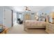 Spacious bedroom with sliding door access to the pool area at 1355 Hempstead Ave, North Port, FL 34286